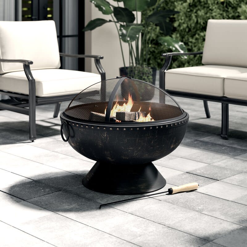 <p><a href="https://go.redirectingat.com?id=74968X1596630&url=https%3A%2F%2Fwww.wayfair.com%2Foutdoor%2Fpdp%2Fgreyleigh-tuscola-firebowl-steel-wood-burning-fire-pit-w003357437.html&sref=https%3A%2F%2Fwww.housebeautiful.com%2Fshopping%2Fhome-accessories%2Fg32129002%2Fbest-fire-pit%2F" rel="nofollow noopener" target="_blank" data-ylk="slk:Shop Now;elm:context_link;itc:0;sec:content-canvas" class="link ">Shop Now</a></p><p>Tuscola Steel Wood Burning Fire Pit</p><p>$152.47</p><p>wayfair.com</p><span class="copyright">Wayfair</span>