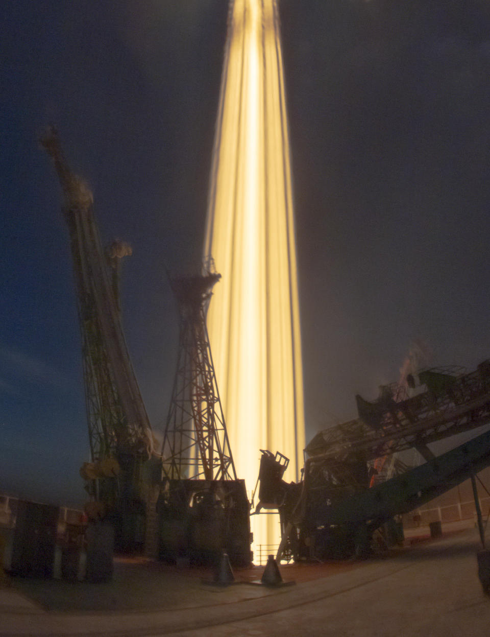 In this photo taken with long time exposure the Soyuz-FG rocket booster with Soyuz MS-11 space ship carrying a new crew to the International Space Station, ISS, blasts off at the Russian leased Baikonur cosmodrome, Kazakhstan, Monday, Dec. 3, 2018. The Russian rocket carries U.S. astronaut Anne McClain, Russian cosmonaut Оleg Kononenko‎ and CSA astronaut David Saint Jacques. (AP Photo/Dmitri Lovetsky)