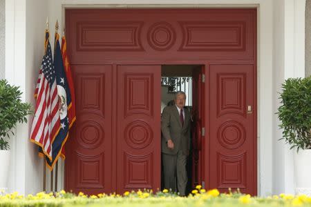 Newly appointed U.S. Ambassador to China Terry Branstad steps out of his residence to meet the media in Beijing, China June 28, 2017. REUTERS/Thomas Peter