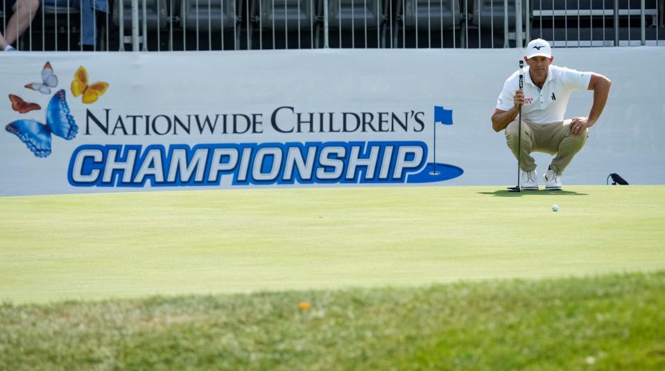 Sep 19, 2024; Columbus, Ohio, USA; Brandon Harkins lines up his putt on the 18th green during the first round of the Korn Ferry Tour's 2024 Nationwide Children’s Hospital Championship at the Ohio State University Golf Club.