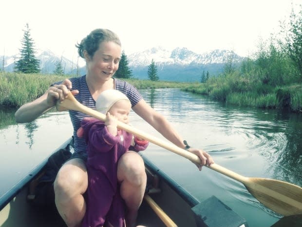 Nadeau is shown paddling a canoe in Alaska, where she now lives and works as a family doctor. 