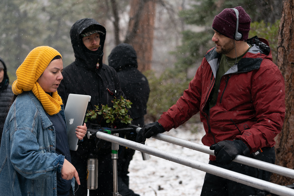 Vincente DiSanti, right, speaks with crew members on the set of "Never Hike Alone," a "Friday the 13th" fan film.