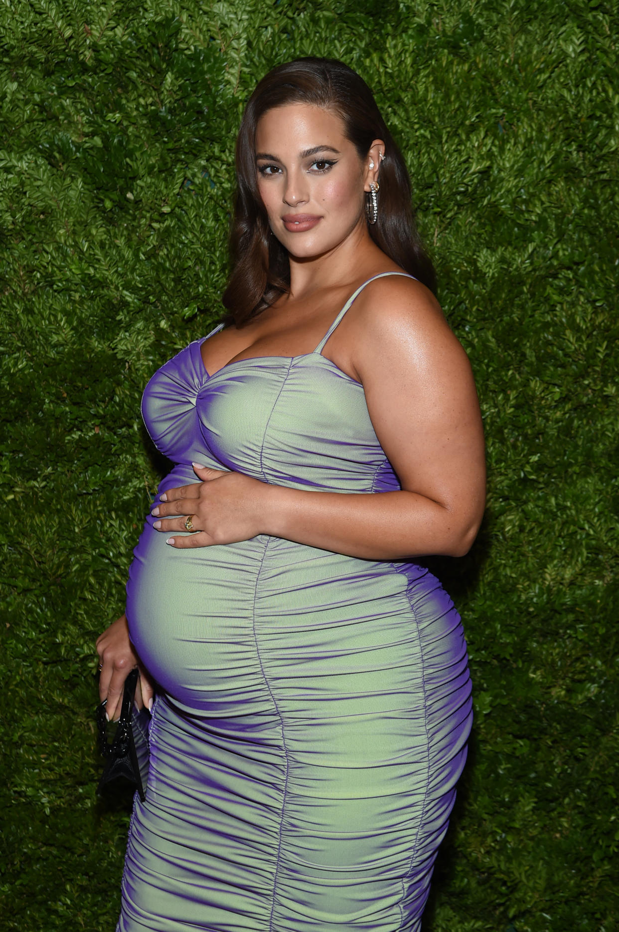 Supermodel Ashley Graham, who is expecting a baby boy in January, posed for a nude photo shoot showing off her yoga skills.  (Photo: Jamie McCarthy/Getty Images)