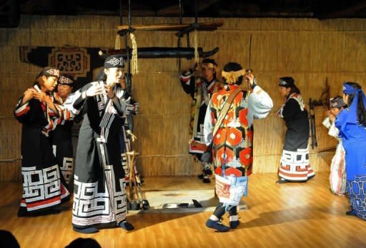 Japan's indigenous Aibu people show their folk dancing at Nibutani Ainu Museum at Biratori in Japan's northern island of Hokkaido. Japan's Ainu ethnic minority have launched an ambitious bid to win 10 seats at next year's parliamentary elections, in the latest move aimed at boosting recognition for what was once a hunter-gatherer society in Hokkaido