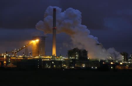 The coking plant and blast furnace of ThyssenKrupp Steel Europe AG are seen in Duisburg in this January 14, 2014 file picture. In recent weeks, the economy that proud German politicians have taken to describing as a "growth locomotive" and "stability anchor" for Europe, has been hit by a barrage of bad news that has surprised even the most ardent Germany sceptics. The big shocker came on August 14, 2014, when the Federal Statistics Office revealed that gross domestic product (GDP) had contracted by 0.2 percent in the second quarter. Picture taken January 14, 2014. TO MATCH STORY GERMANY-ECONOMY/ REUTERS/Ina Fassbender/Files (GERMANY - Tags: POLITICS ENERGY)