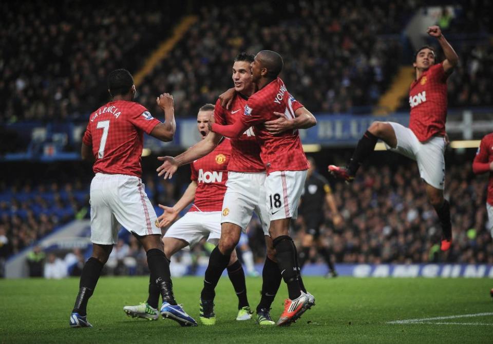 Van Persie with Ashley Young after scoring at Stamford Bridge in October 2012