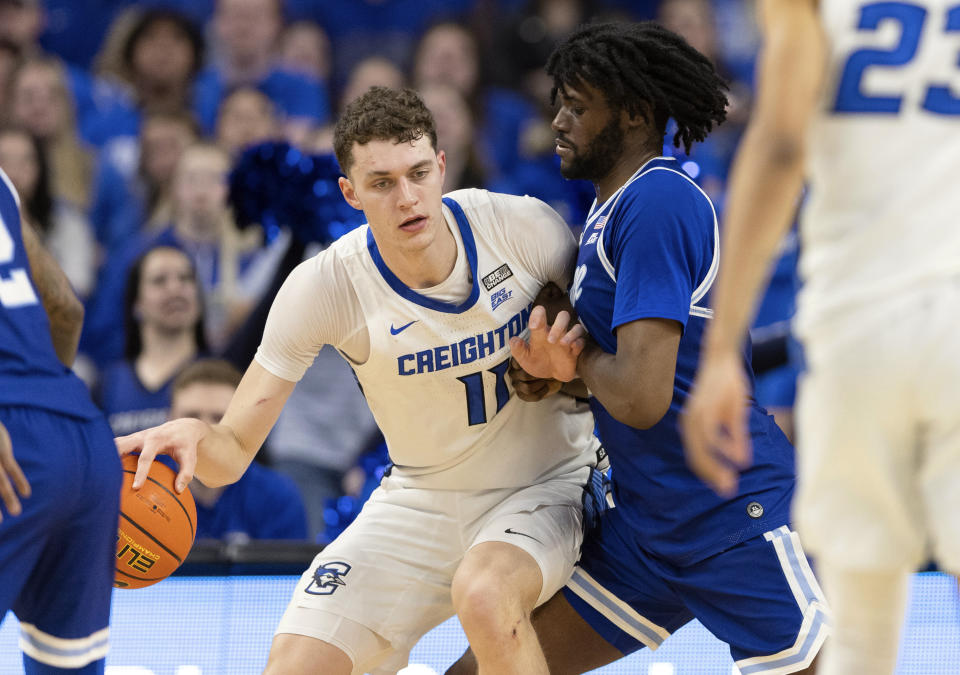 Creighton's Ryan Kalkbrenner, left, drives against Seton Hall's Jaden Bediako during the first half of an NCAA college basketball game Wednesday, Feb. 28, 2024, in Omaha, Neb. (AP Photo/Rebecca S. Gratz)