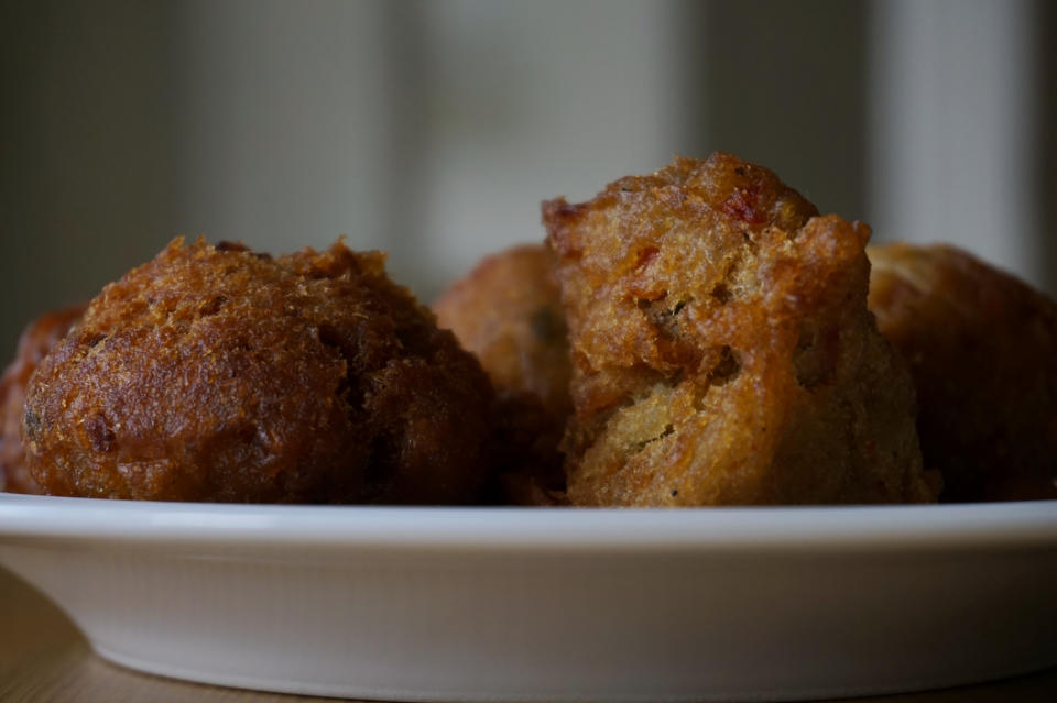 Close-up of three muffins on a plate