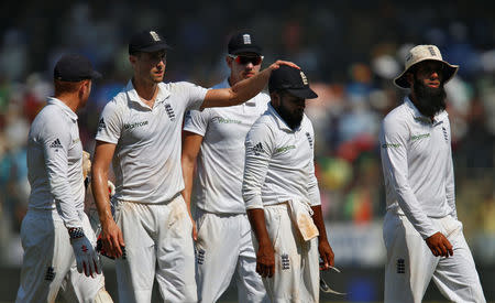 Cricket - India v England - Fourth Test cricket match - Wankhede Stadium, Mumbai, India - 11/12/16. England's players walk off the field. REUTERS/Danish Siddiqui