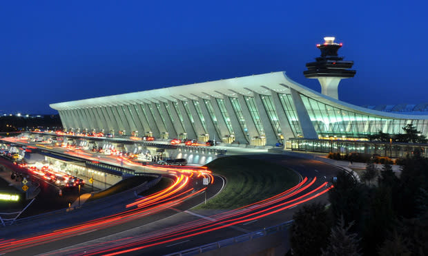 The main terminal of Washington Dulles International Airport at dusk in Virginia/Credit: Joe Ravi/Shutterstock.com