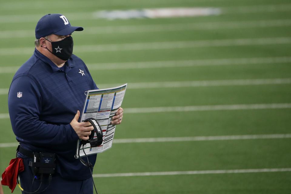 Dallas Cowboys head coach Mike McCarthy watches play against the Atlanta Falcons in the first half of an NFL football game in Arlington, Texas, Sunday, Sept. 20, 2020. (AP Photo/Ron Jenkins)