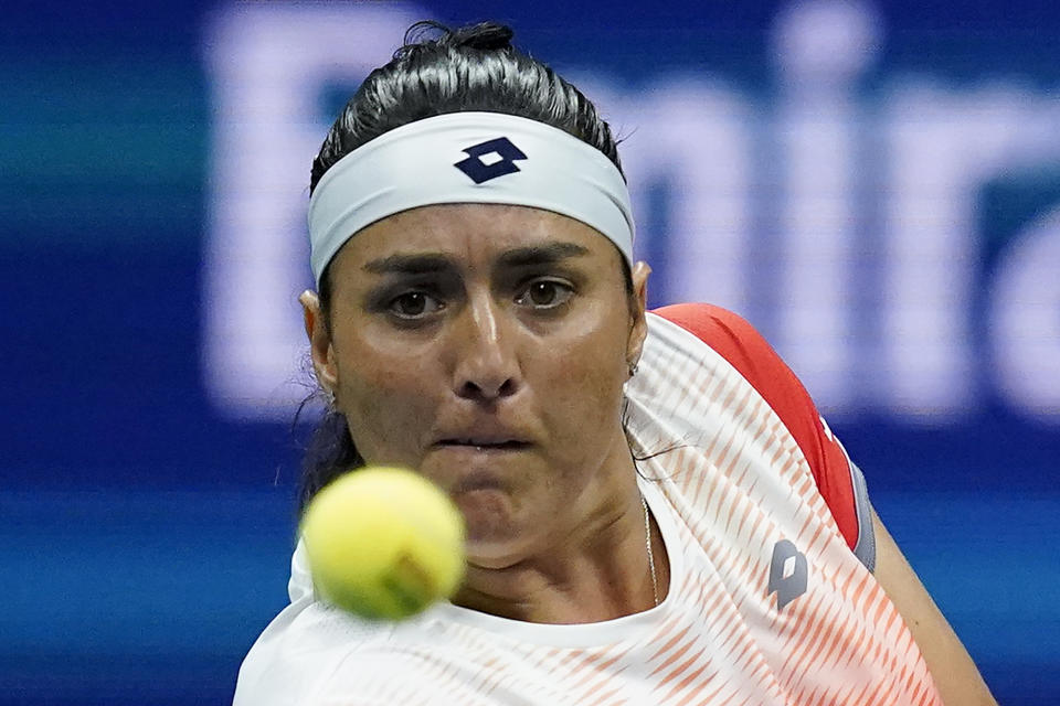 Ons Jabeur, of Tunisia, returns a shot to Ajla Tomljanovic, of Austrailia, during the quarterfinals of the U.S. Open tennis championships, Tuesday, Sept. 6, 2022, in New York. (AP Photo/Julia Nikhinson)