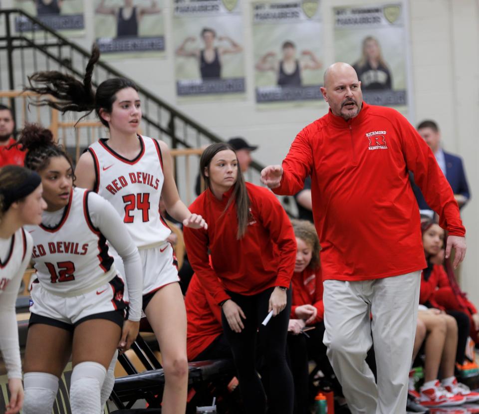 Richmond head coach Clay Bolser sends a few starters back into the game during sectionals against New Palestine Feb. 1, 2023.