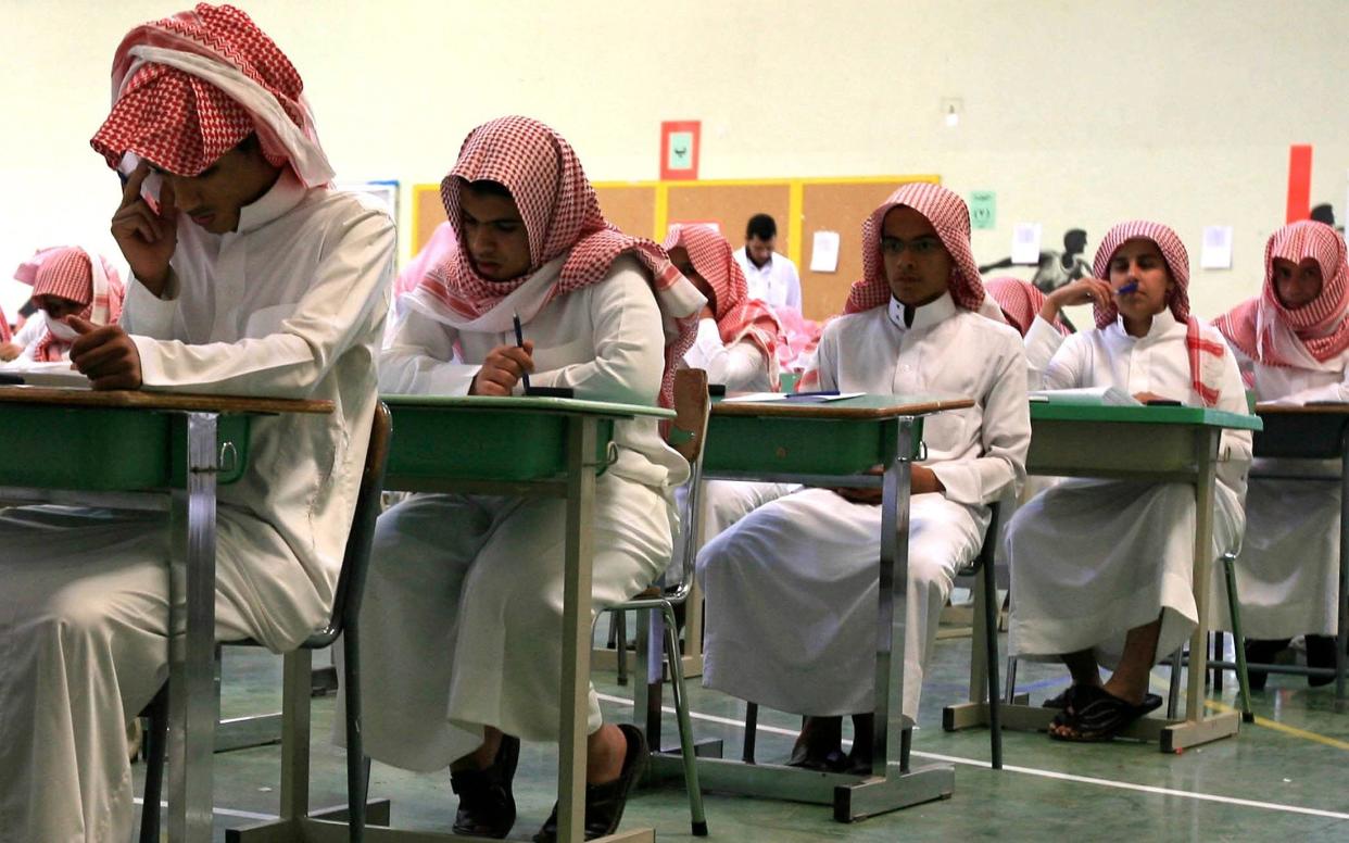 Secondary students sit for an exam in a government school in Riyadh - FAHAD SHADEED /Reuters 