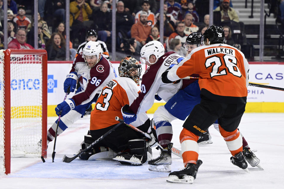 Colorado Avalanche's Mikko Rantanen (96) scores a goal past Philadelphia Flyers goaltender Samuel Ersson (33) during the third period of an NHL hockey game, Saturday, Jan. 20, 2024, in Philadelphia. (AP Photo/Derik Hamilton)