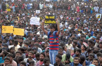 People attend a protest demanding to reverse a Supreme Court ban on the traditional bull-taming contests, known as Jallikattu, at the Marina beach in Chennai, January 19, 2017. REUTERS/Stringer