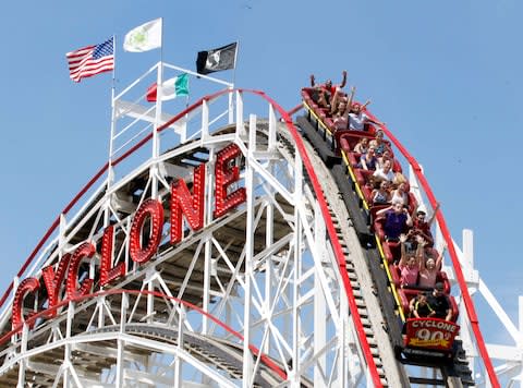 The Cyclone, one of America's oldest wooden roller coasters in operation - Credit: Getty