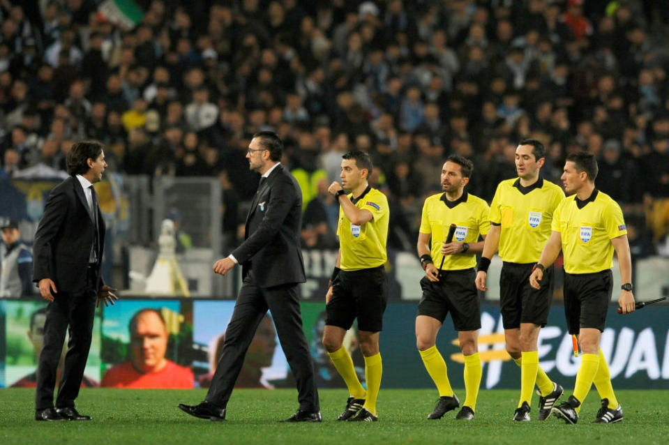 Lazio coach Simone Inzaghi complains to officials about their decisions at half-time.