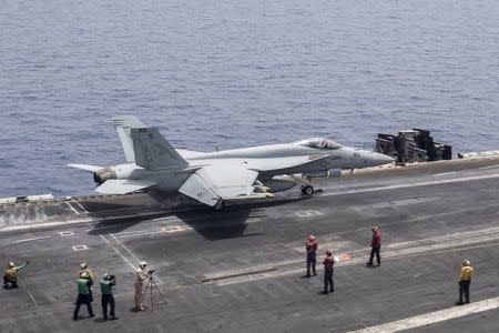A U.S. Navy F/A-18E Super Hornet fighter jet launches from the flight deck of the aircraft carrier USS Harry S. Truman in the Mediterranean Sea in a photo released by the US Navy June 3, 2016. U.S. Navy/Mass Communication Specialist 3rd Class Bobby J Siens/Handout via REUTERS