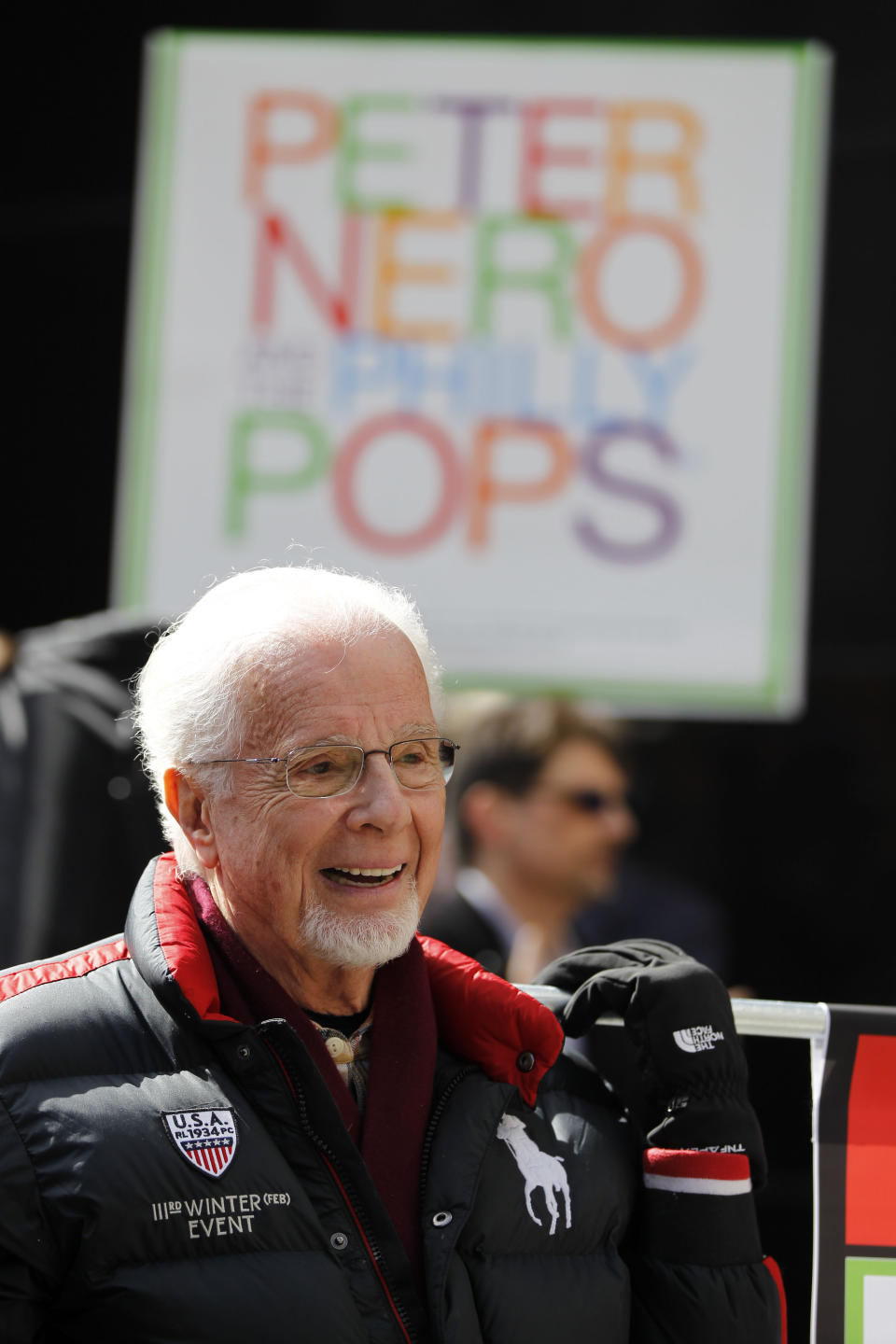 FILE - Philly Pops music director Peter Nero, musicians, staff and others march to their new headquarters Tuesday, March 6, 2012, in Philadelphia. Nero, a Grammy-winning pianist who interpreted pop songs through classical and jazz forms and served as the Philly Pops' conductor for more than three decades, died Thursday, July 6, 2023. He was 89. (AP Photo/Matt Rourke, File)