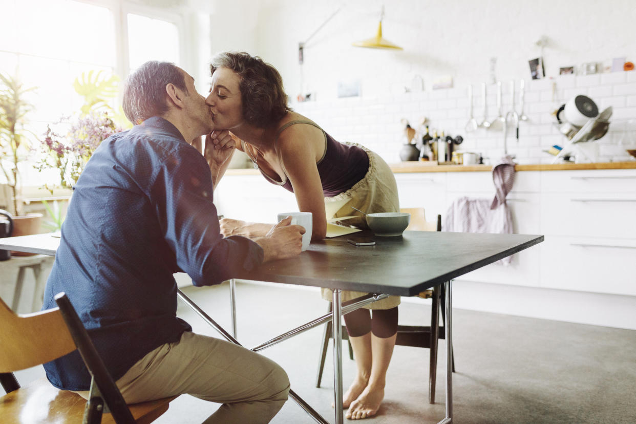 Older couple kissing. (Getty Images)