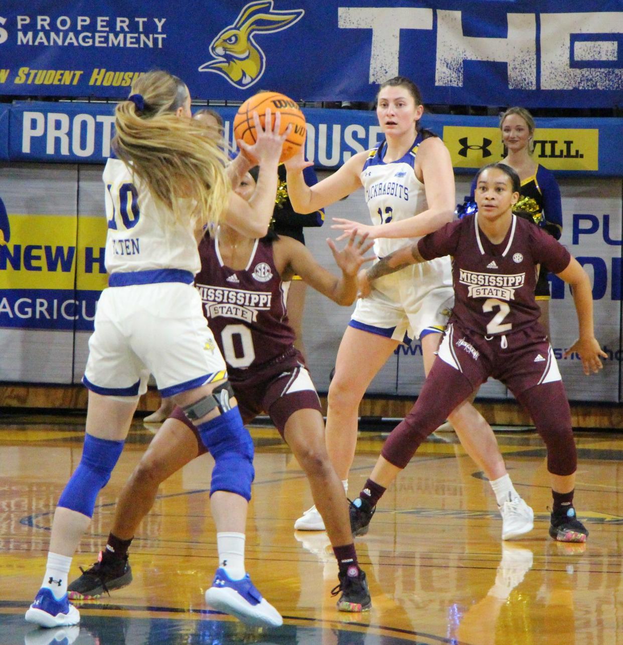 SDSU's Kallie Theisen posts up while Mississippi State's Jerkaila Jordan (2) defends on Monday night at Frost Arena.