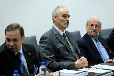 Syrian Ambassador to the U.N. Bashar al Jaafari (C) attends a meeting of Intra-Syria peace talks with UN Special Envoy for Syria Staffan de Mistura at Palais des Nations in Geneva, Switzerland, February 25, 2017. REUTERS/Pierre Albouy