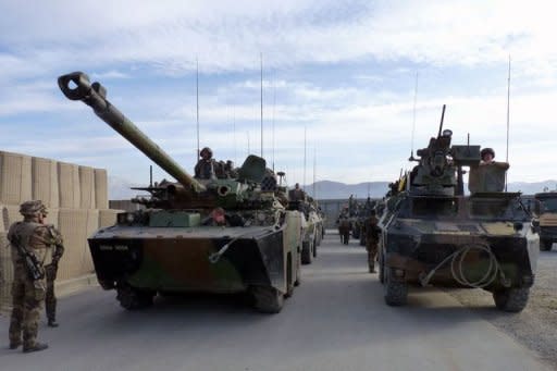 French military vehicles, which left French military Camp Nijrab in Kapisa province, arrive at French military Camp Warehouse in Kabul. France ended its combat mission in Afghanistan on Tuesday, withdrawing troops from a strategic province northeast of Kabul as part of a quickened departure from the war-torn country