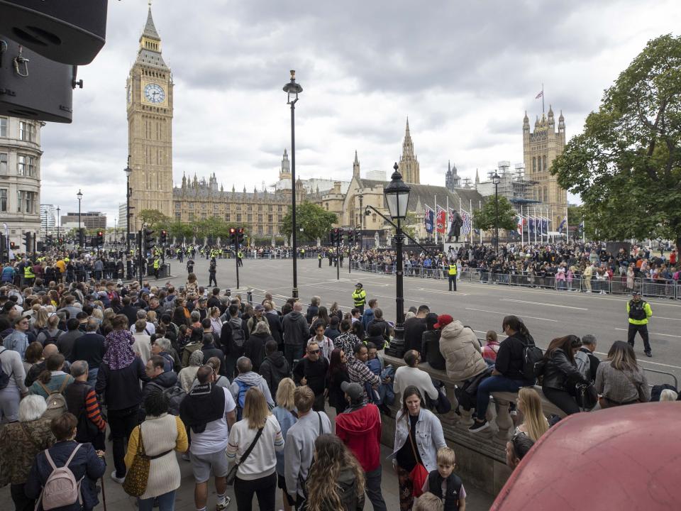 People queue to see Queen Elizabeth II lying-in-state in Westminster Hall, London.