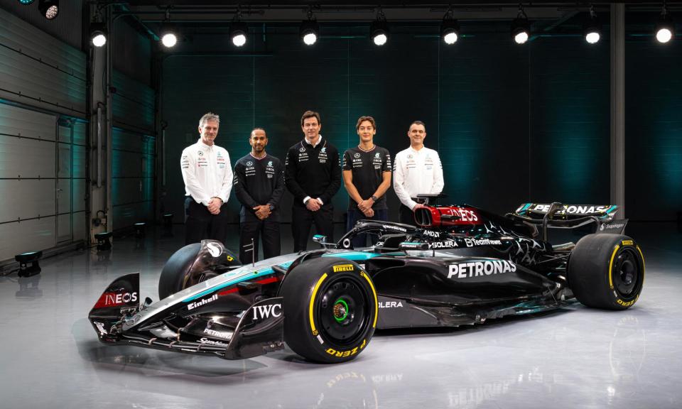 <span>The Mercedes car is unveiled with (l-r) technical director James Allison, Lewis Hamilton, Toto Wolff, George Russell and the managing director of HPP, Hywel Thomas.</span><span>Photograph: Mercedes/AFP/Getty Images</span>