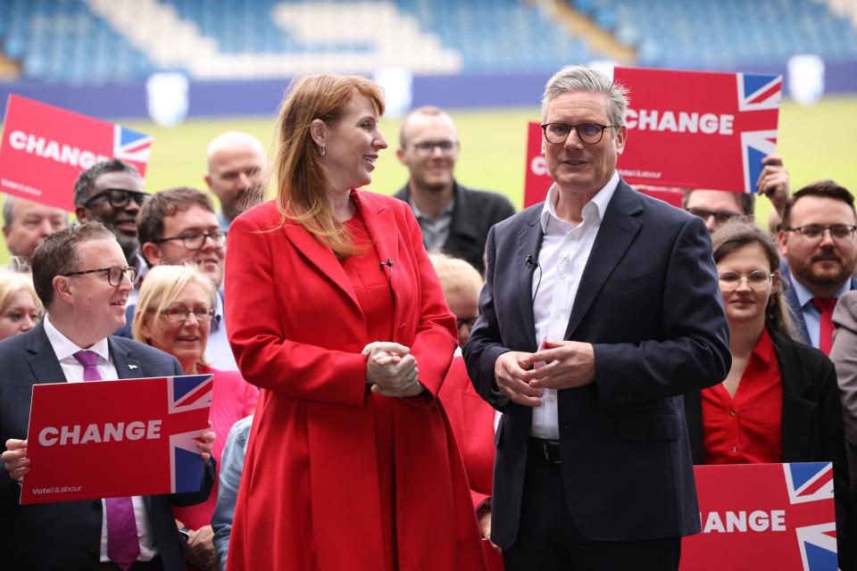 Deputy Leader Angela Rayner and Labour Leader Keir Starmer are joined by supporters as they speak to the media on the first day of campaigning at Gillingham football club (Getty Images)