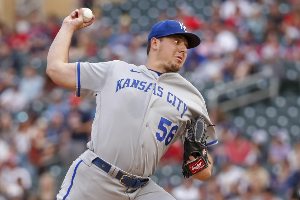 Kansas City Royals starting pitcher Brad Keller throws to a Minnesota Twins batter during the first inning of a baseball game Friday, May 27, 2022, in Minneapolis. (AP Photo/Bruce Kluckhohn)