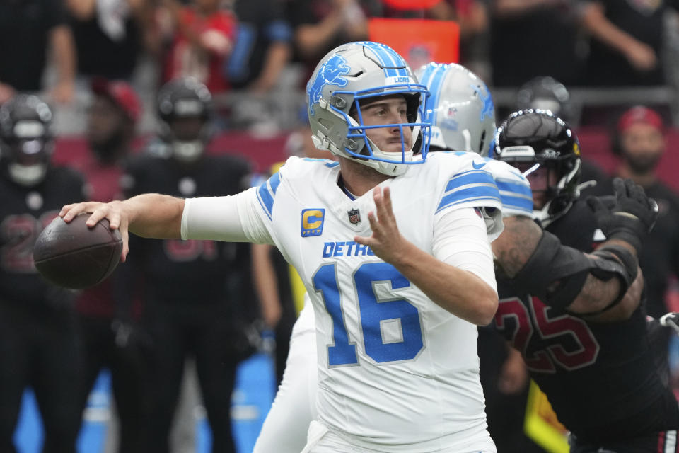 Detroit Lions quarterback Jared Goff (16) throws against the Arizona Cardinals during the first half of an NFL football game Sunday, Sept. 22, 2024, in Glendale, Ariz. (AP Photo/Rick Scuteri)