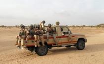 Nigerien soldiers patrol at the border with neighbouring Nigeria near the town of Diffa, Niger, June 21, 2016. REUTERS/Luc Gnago