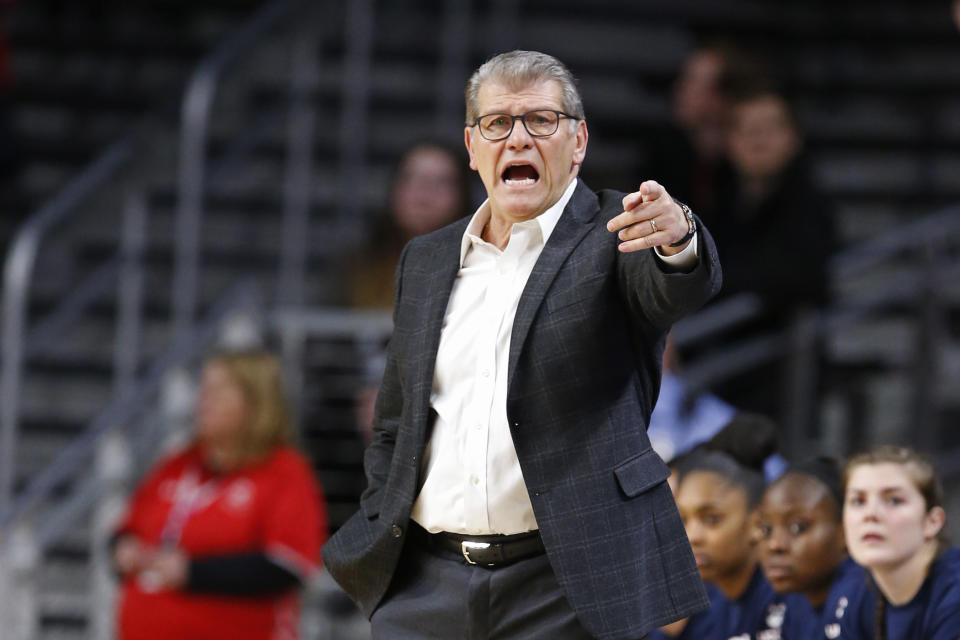 Connecticut coach Geno Auriemma instructs the team during the first half of an NCAA college basketball game against Cincinnati, Wednesday, Feb. 26, 2020, in Cincinnati. (AP Photo/Gary Landers)