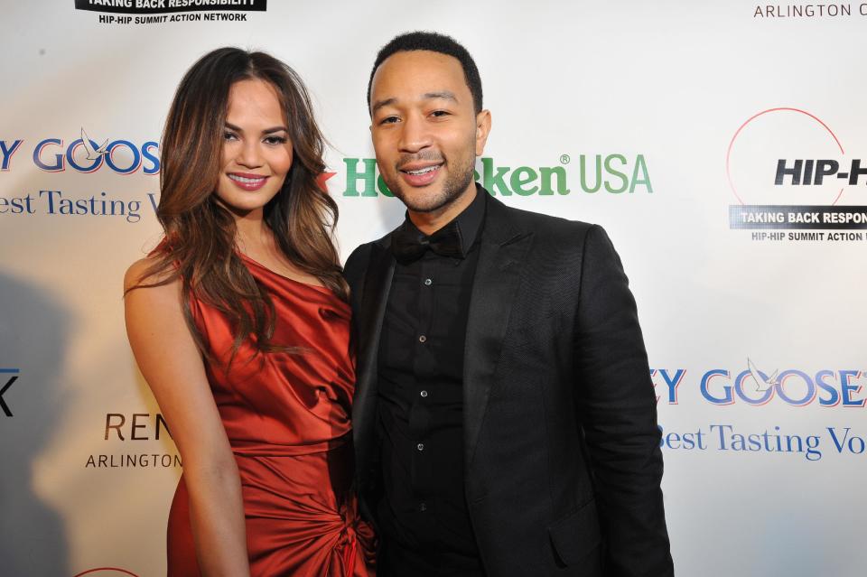 Christine Teigen, left, and John Legend are seen at the Hip-Hop Inaugural Ball on Sunday, Jan. 20, 2013 in Washington. (Photo by Larry French/Invision/AP)