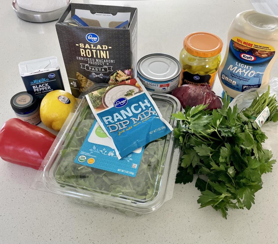 Ingredients for tuna pasta salad on the counter