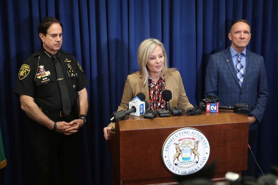 Oakland county Sheriff Michael Bouchard, Oakland County Prosecutor Karen McDonald and Oakland County Executive David Coulter during a press conference after the guilty plea entered by Ethan Crumbley in front of Circuit Court Judge  Kwame L. Rowe Monday, October 24, 2022 at Oakland Co. Courthouse.