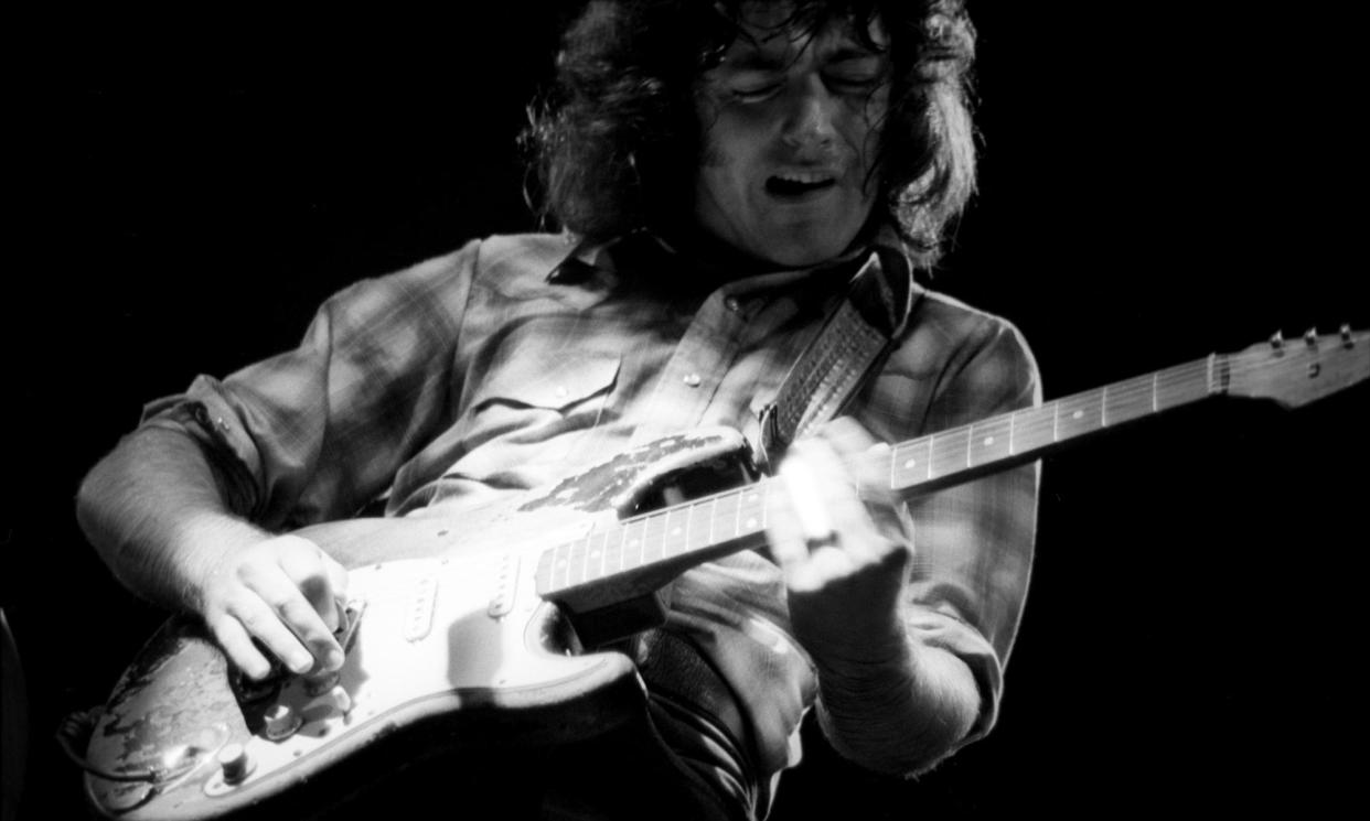 <span>The Irish songwriter and guitar impresario Rory Gallagher plays his Fender Stratocaster at the Schaefer Music Festival in Central Park, New York, on 7 September 1974.</span><span>Photograph: Icon and Image/Getty Images</span>