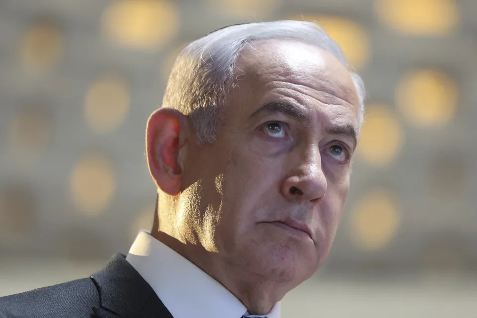 Israeli Prime Minister Benjamin Netanyahu attends a memorial ceremony for Israeli soldiers who fell in battle during the 2014 Gaza War, in the Hall of Remembrance at Mount Herzl Military Cemetery in Jerusalem on Tuesday, July 16, 2024. (Abir Sultan/Pool Photo via AP)