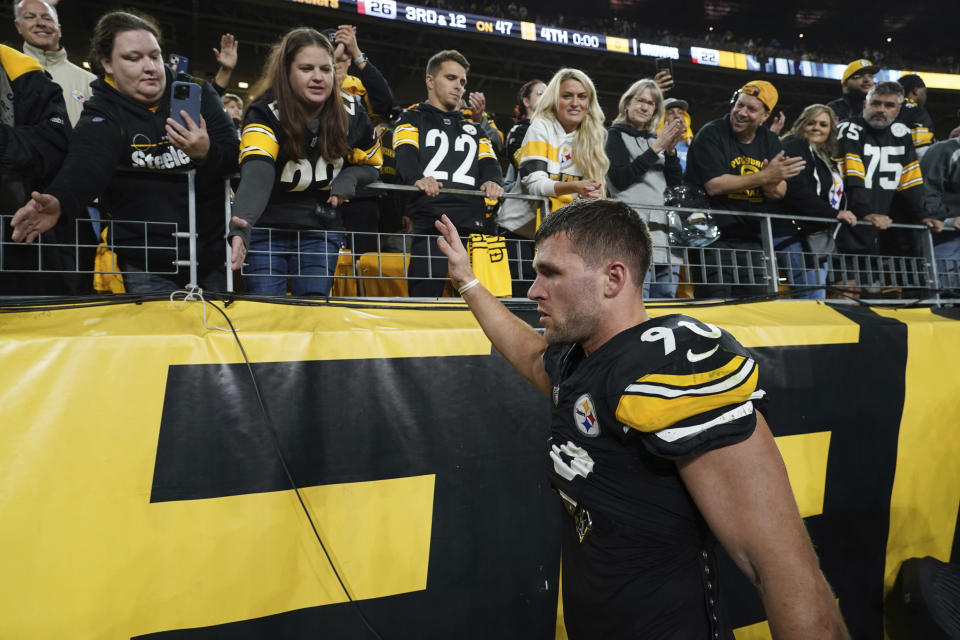 CORRECTS PHOTOGRAPHER TO MATT FREED INSTEAD OF GENE J. PUSKAR - Pittsburgh Steelers linebacker T.J. Watt waves to fans after a win over the Cleveland Browns in an NFL football Monday, Sept. 18, 2023, in Pittsburgh. (AP Photo/Matt Freed)