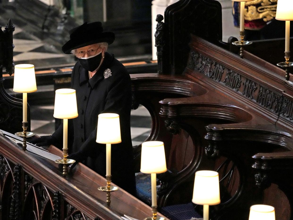 <p>The Queen sat alone during Prince Philip’s funeral, attendance at which was limited to 30 mourners</p> (Reuters)