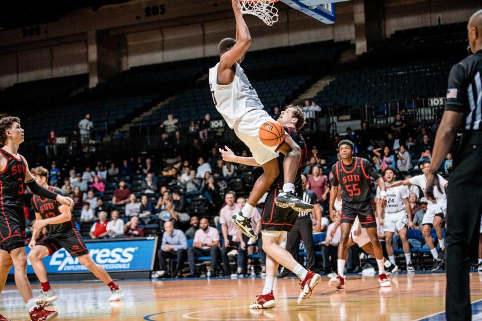 While earning CBI All-Tournament Team honors, Eastern Kentucky big man Isaiah Cozart (dunking) averaged 18 points, 11 rebounds and three blocks while shooting 64 percent from the field.