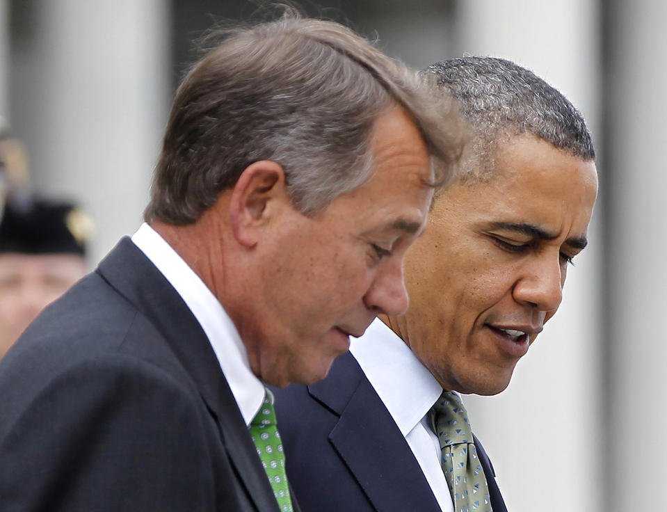 President Barack Obama talks with House Speaker John Boehner of Ohio on Capitol Hill in Washington, Tuesday, March 20, 2012, after attending a St. Patrick's Day luncheon with Irish Prime Minister Enda Kenny. (AP Photo/Pablo Martinez Monsivais)