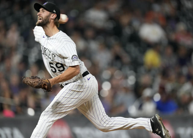 Cron, Rockies rain homers on Padres for 7-2 opening win