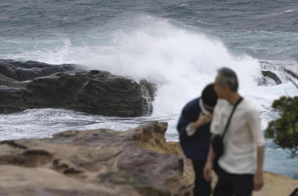 Waves hit the shore in Shirahama, Wakayama prefecture, western Japan Monday, Aug. 14, 2023. A storm that used to be a typhoon has made a landfall at Japan's central region Tuesday and hitting large areas of western Japan with heavy rain and high winds. (Kyodo News via AP)