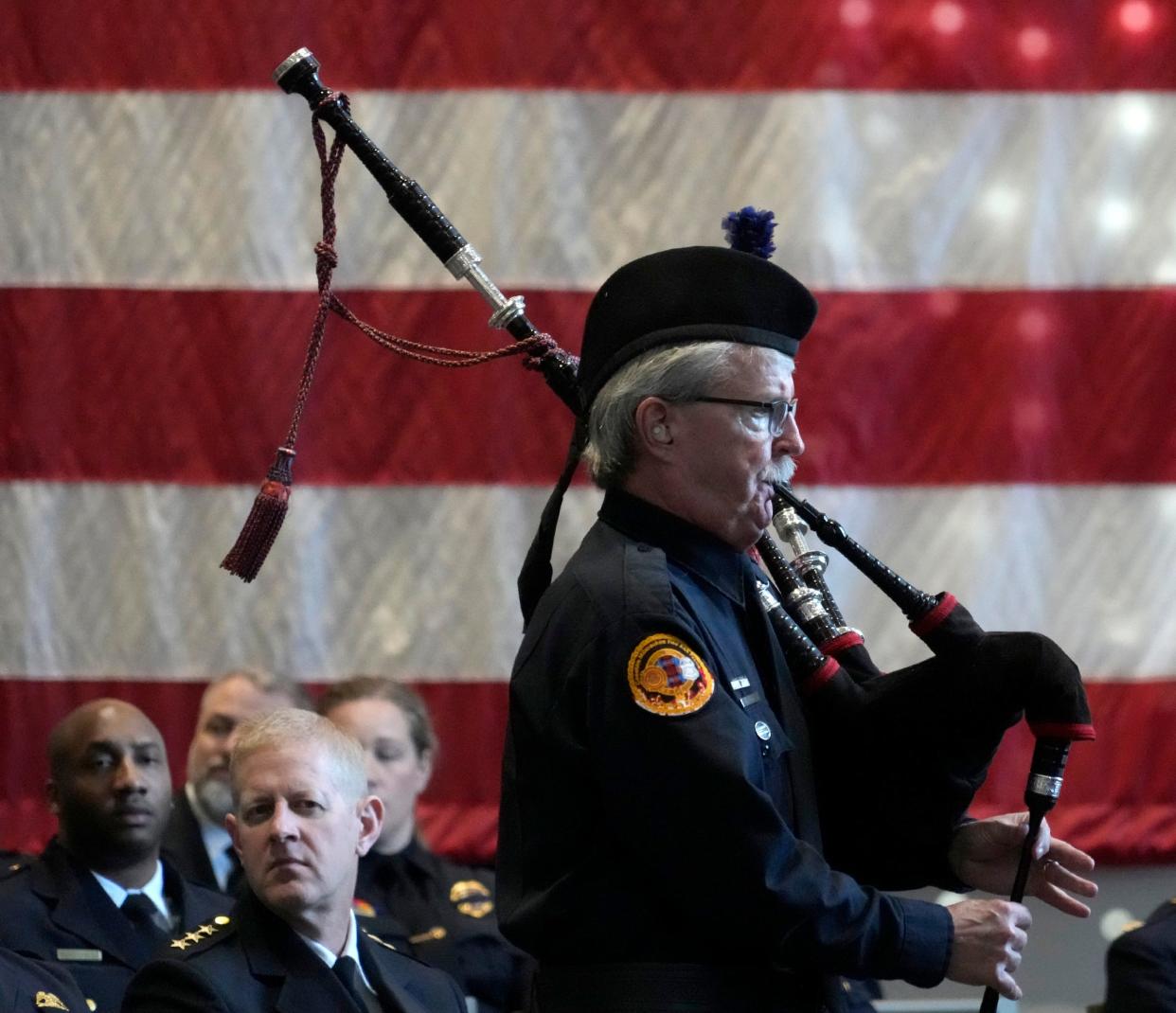 A member of the Greater Milwaukee Fire and Police Pipes and Drums performs during the memorial wreath presentation ceremony as part of the annual Greater Milwaukee Law Enforcement Memorial Ceremony at the Milwaukee County War Memorial Center in Milwaukee on Thursday, May 9, 2024.