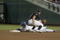 Jun 21, 2018; Omaha, NE, USA; Florida Gators shortstop Deacon Liput (8) slides safely into second against Texas Tech Red Raiders shortstop Michael Davis (3) in the seventh inning in the College World Series at TD Ameritrade Park. Mandatory Credit: Bruce Thorson-USA TODAY Sports