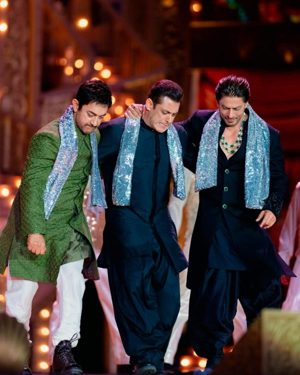 This photograph released by the Reliance group shows L to R, Bollywood stars Amir Khan, Salman Khan and Shah Rukh Khan performing at a pre-wedding bash of billionaire industrialist Mukesh Ambani's son Anant Ambani in Jamnagar, India, Saturday, Mar. 02, 2024.