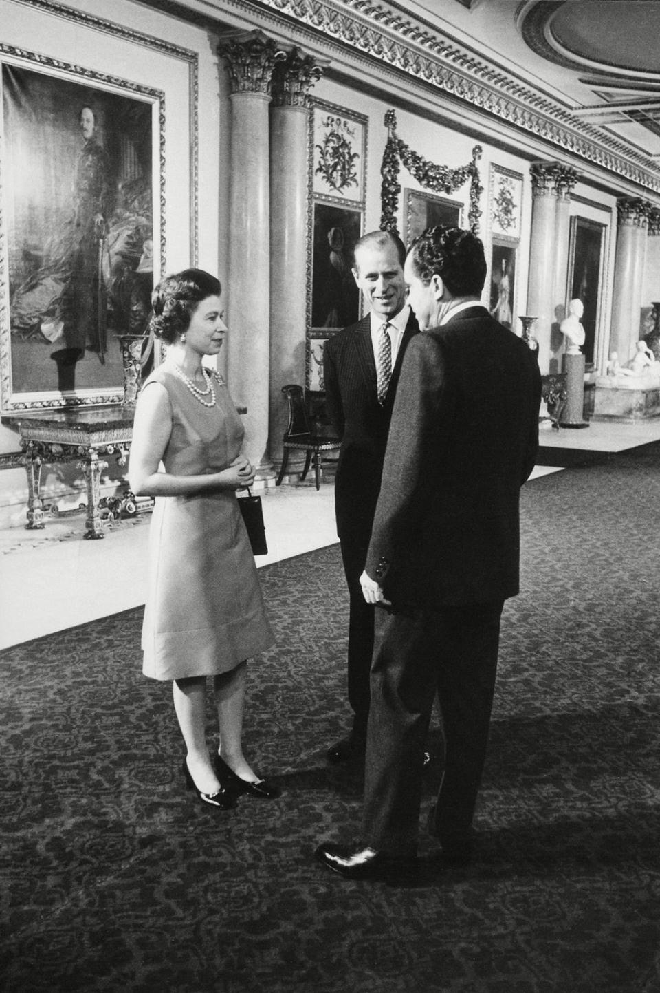 President Nixon chats with Queen Elizabeth II and Prince Phillip at Buckingham Palace, 25 February 1969 (Everett/Shutterstock)